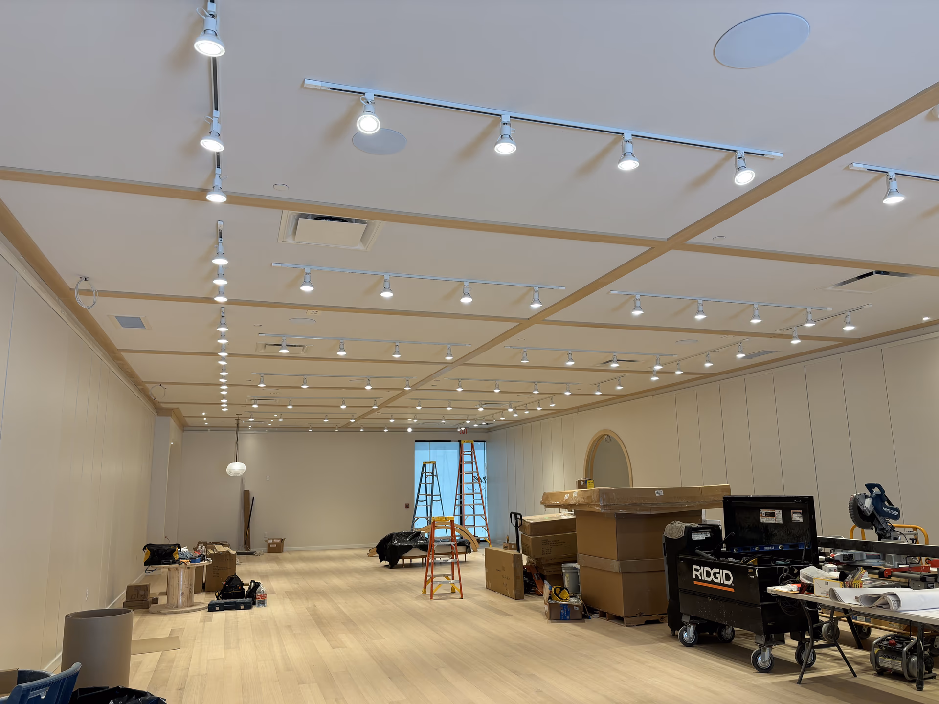 Track lighting installation in progress at Aerie, Century Square in College Station